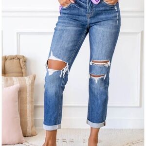 Cute destroyed jeans with tags.